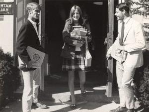 Female 信誉最好的网投十大平台 student with books leaving Mather Hall at registration time, 1969.